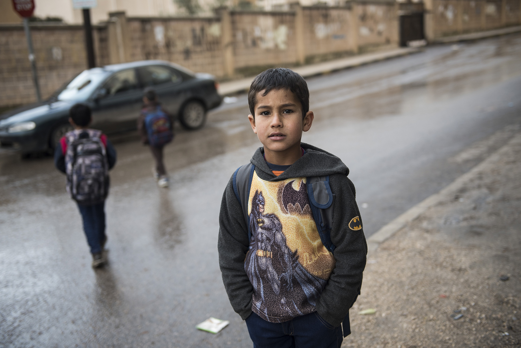 PHOTO:  Zaher is eight years old and lives with his family in Irbid, Jordan. His family left Syria after the war broke out and they have received emergency cash assistance from CARE to help them with purchasing food.