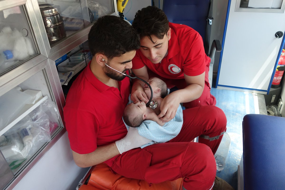 PHOTO: The Syrian Red Crescent moved conjoined twins Nawras and Moaz from Ghouta to a hospital in Damascus.