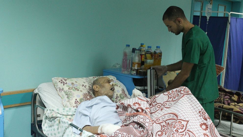 PHOTO: A staffer tends to a patient at El-Wafa hospital in eastern Gaza City. 