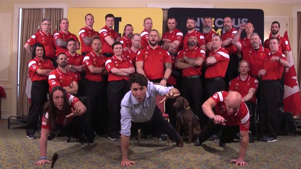 PHOTO: Canadian Prime Minister Justin Trudeau shows his country is ready for the Invictus Games by doing pushups with the Canadian team. 