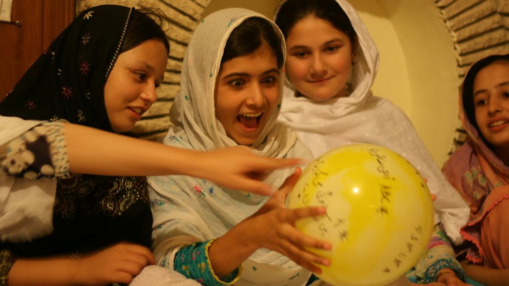 Malala Yousafzai,11, with her friends at summer camp.