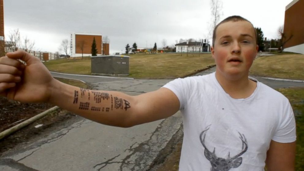 PHOTO: A Norwegian teen tattooed a receipt from McDonald's on his arms.