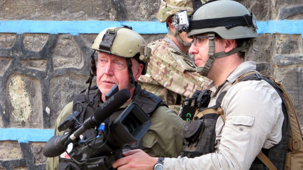 Mike, left, and Carlos Boettcher on an operation in Kunar Province, Afghanistan.