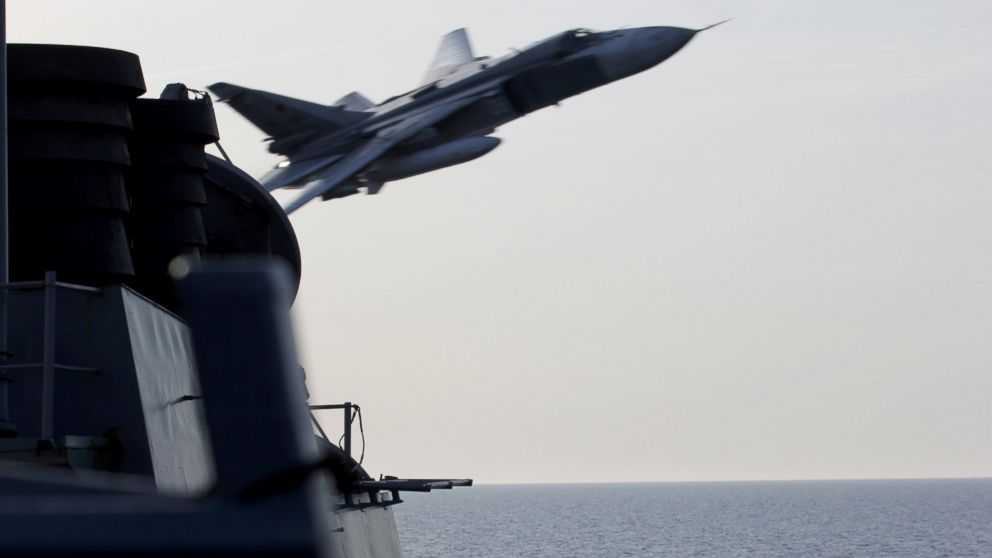 The US European Command released this photo of a Russian SU-24 fighter jet's close pass over the USS Donald Cook earlier this week in the Baltic Sea. 
