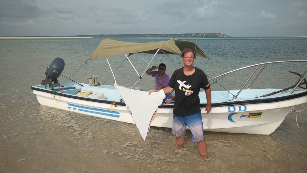 PHOTO: Blaine Alan Gibson holds debris he found on a beach in Mozambique. Officials are investigating if it is from the missing Malaysian Airline flight 370. 