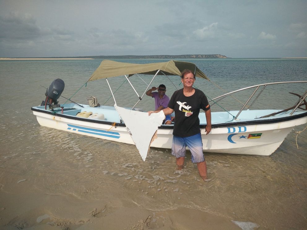 PHOTO: Blaine Alan Gibson holds debris he found on a beach in Mozambique. Officials are investigating if it is from the missing Malaysian Airline flight 370. 