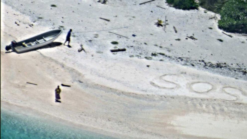 Two mariners who wrote "SOS" in the sand after being stranded on an uninhabited Pacific island in Chuuk State, Federated States of Micronesia were rescued, Aug. 26, 2016.