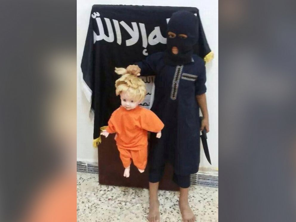 PHOTO: In ISIS's Raqqa training camps, children are taught how to cut off the heads of blonde, blue-eyed dolls.