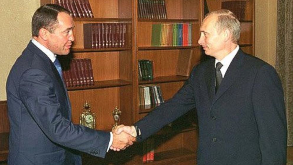 PHOTO:President Putin is seen with then-Media Minister Mikhail Lesin in this undated file photo. 
