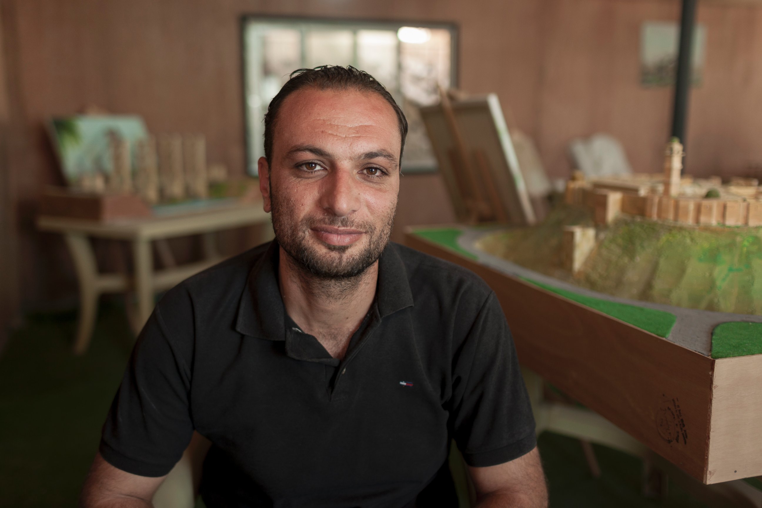PHOTO: Ahmad Hariri, who initially brought the group together and helps source their materials, says the project can help educate children in the camp about their homeland. 
