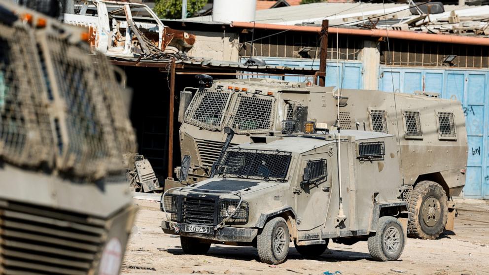PHOTO: Israeli military vehicles operate during a raid at the Al-Faraa camp near Tubas, in the Israeli-occupied West Bank, on Jan. 7, 2025.