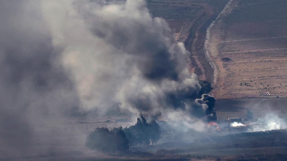 This picture taken from Israel along the border with southern Lebanon shows smoke billowing above the Lebanese village of Wazzani during Israeli bombardment on September 16, 2024. (Photo by Jalaa MAREY / AFP) (Photo by JALAA MAREY/AFP via Getty Images)