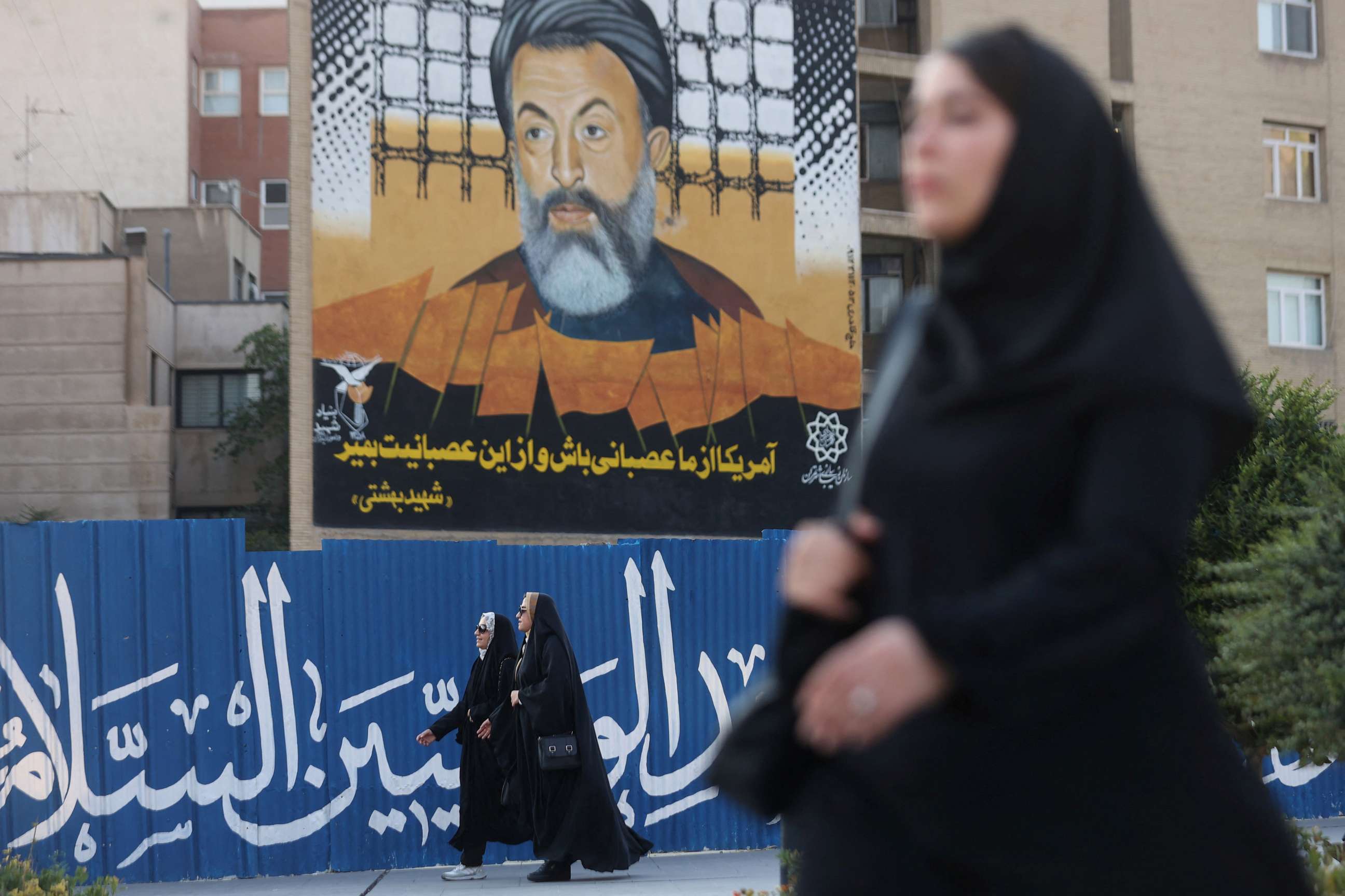PHOTO: Iranian women walk on a street in Tehran, Iran, August 13, 2023.