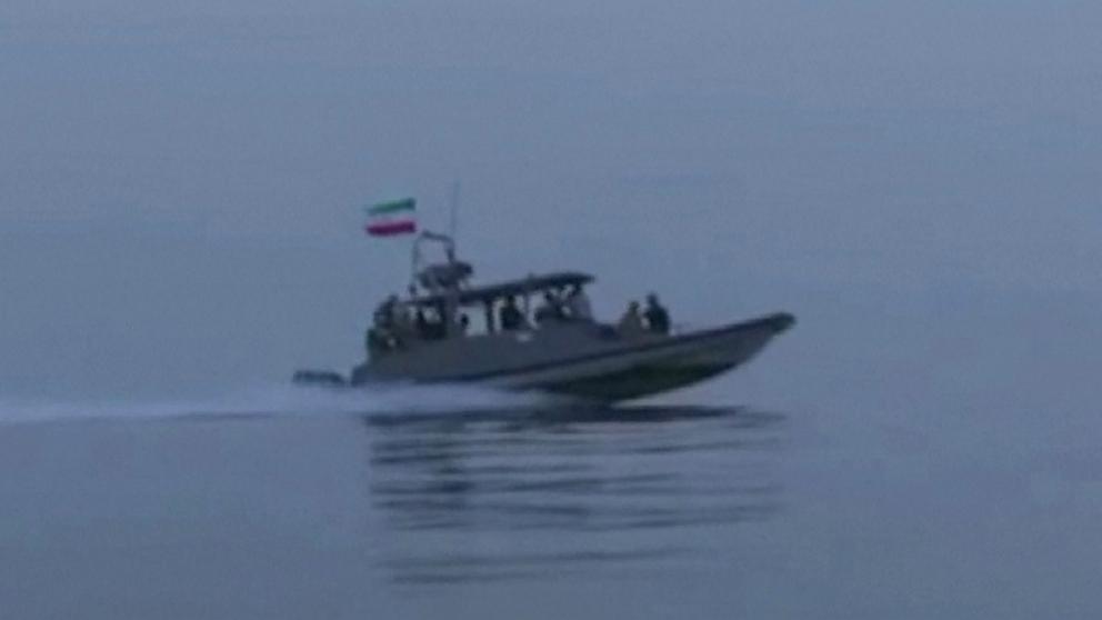 PHOTO: This screen grab taken from a video released by Iran's IRGC and made available via Iran's state broadcaster on April 23, 2026, shows an IRGC boat allegedly taking part in an operation to seize ships attempting to cross the Strait of Hormuz.