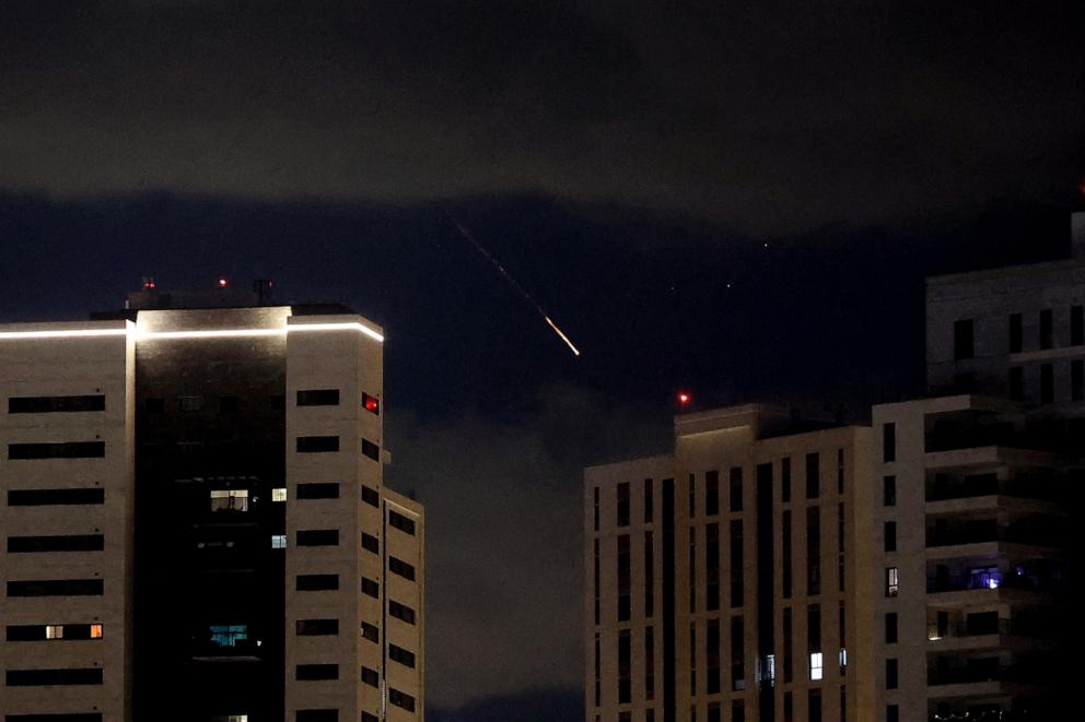 PHOTO: Rocket trails are seen in the sky above the Israeli center coastal city of Netanya amid a fresh barrage of Iranian missile attacks on March 9, 2026. 