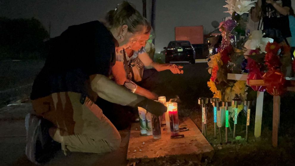 PHOTO: A makeshift altar marks the spot where multiple migrants were struck by the vehicle here in Brownsville, Texas, on May 7, 2023. People have been trickling in and paying respect.