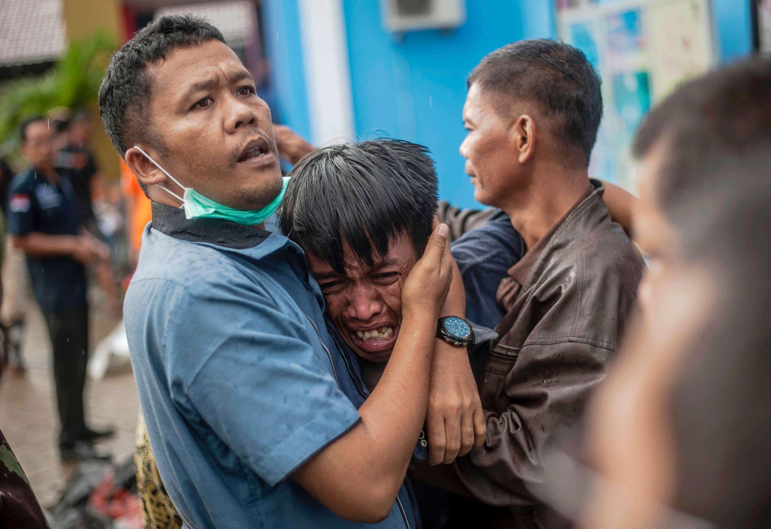 PHOTO: A man reacts after identifying his relative among the bodies of tsunami victims in Carita, Indonesia,  Dec. 23, 2018.