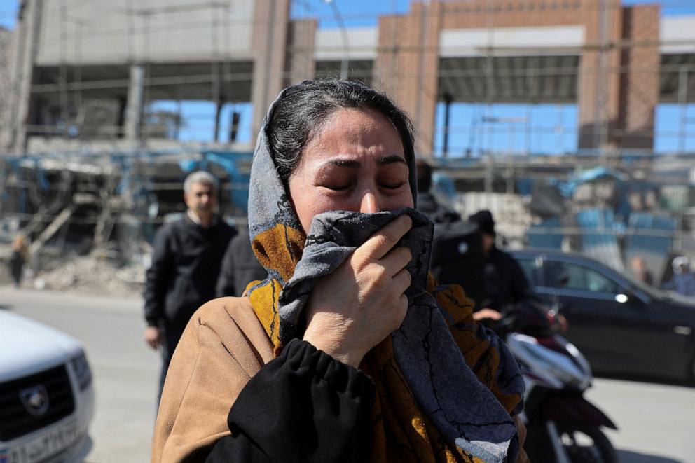PHOTO: A woman reacts on the street following an airstrike on a police station in Tehran, Iran, on March 3, 2026.