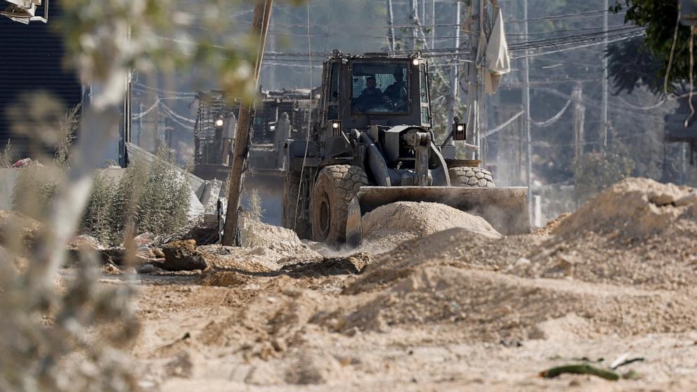 PHOTO: Israeli heavy machinery operates during an Israeli raid in Tulkarm, in the Israeli-occupied West Bank, on Oct. 31, 2024.