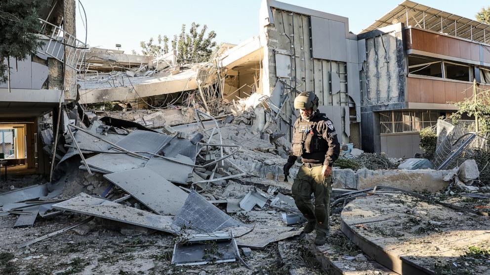 PHOTO: A member of a bomb disposal unit inspects the rubble of a destroyed school building in Ramat Gan, near Tel Aviv, on Dec. 19, 2024.