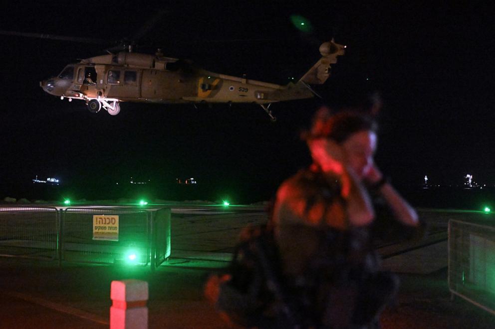 PHOTO: An Israeli soldier stands by after a military helicopter dropped off patients injured in a drone attack from Lebanon at the Rambam Health Care Campus in Haifa, Israel, on Oct. 13, 2024.