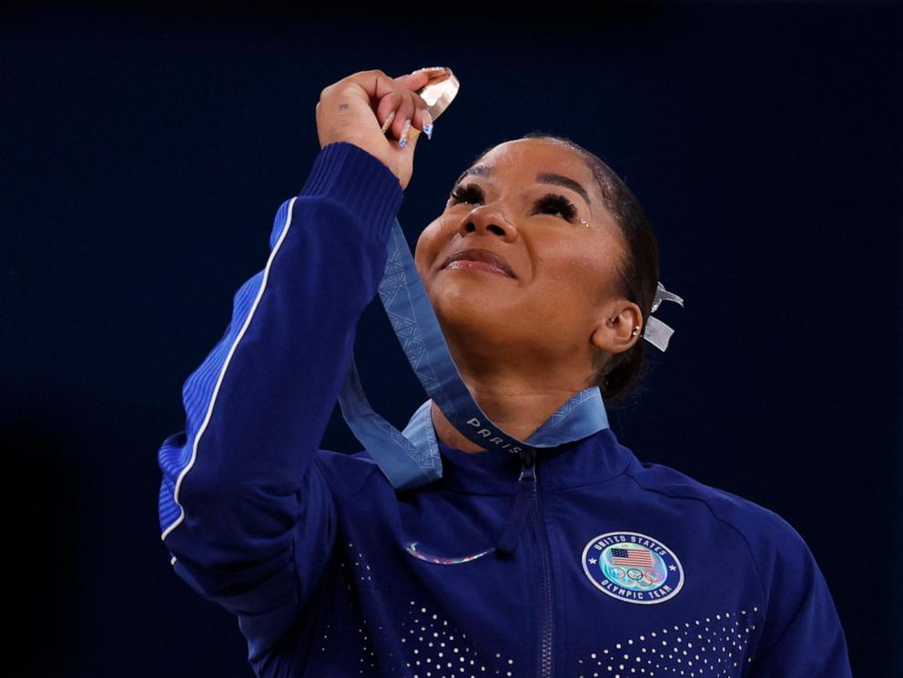 PHOTO: Bronze medallist Jordan Chiles of United States looks at her medal at the 2024 Paris Olympics in Bercy Arena in Paris, France, Aug. 5, 2024. 