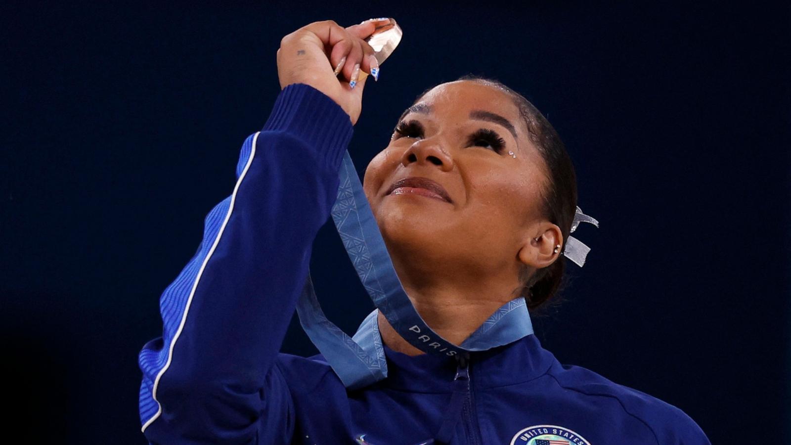 PHOTO: Bronze medallist Jordan Chiles of United States looks at her medal at the 2024 Paris Olympics in Bercy Arena in Paris, France, Aug. 5, 2024.