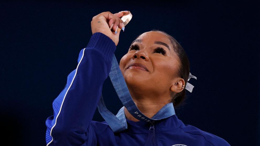 PHOTO: Bronze medallist Jordan Chiles of United States looks at her medal at the 2024 Paris Olympics in Bercy Arena in Paris, France, Aug. 5, 2024. 