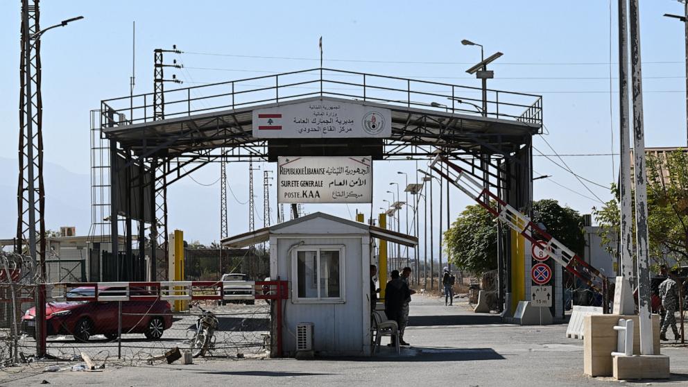 PHOTO: Lebanese government officials stand on Lebanon's side of the border with Syria close to the Jousieh border crossing on Oct. 28, 2024.