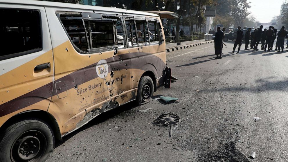 PHOTO: Police officers stand guard after rockets hit residential areas in Kabul, Afghanistan November 21, 2020. 
