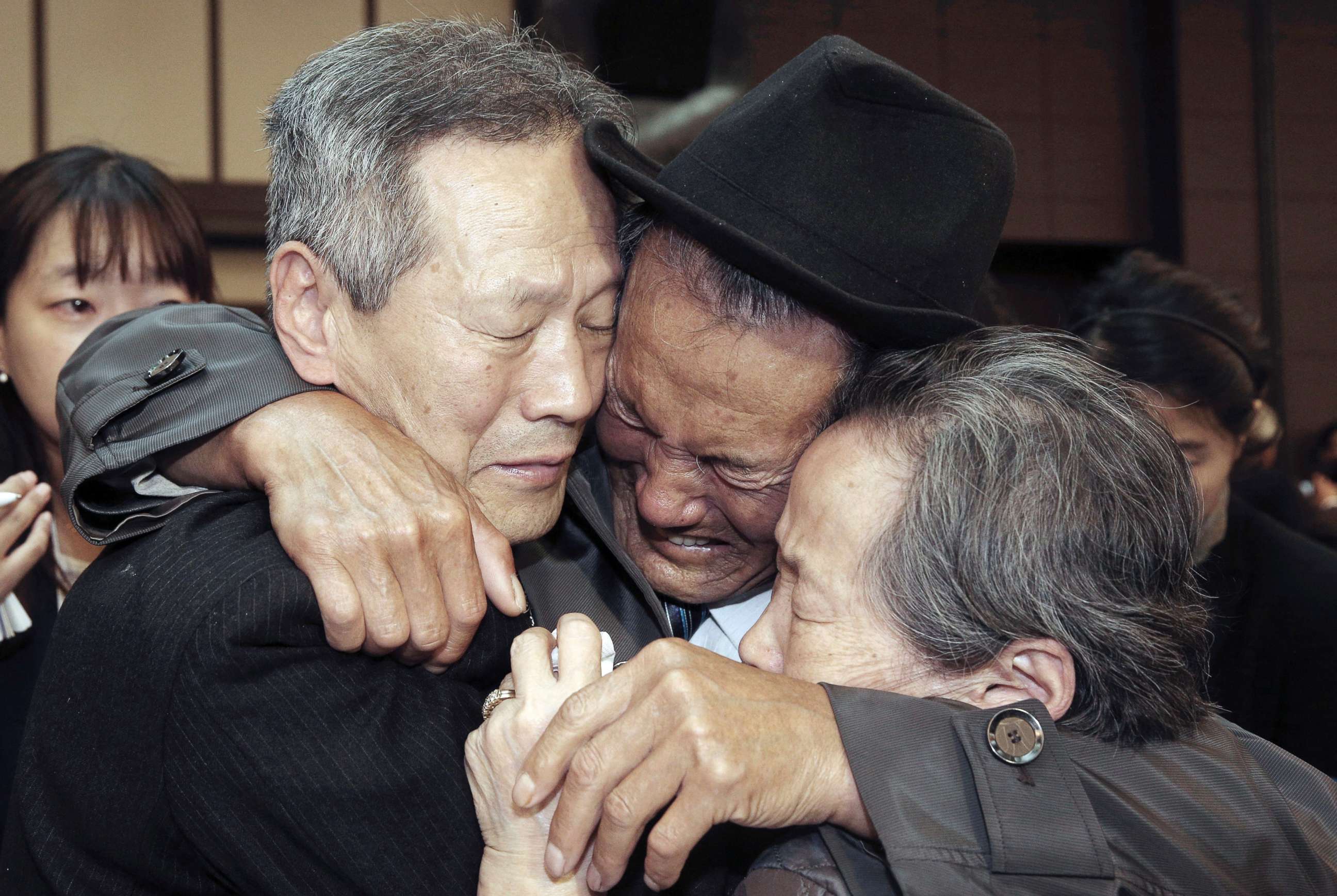 PHOTO: North Korean Son Kwon Geun, center, weeps with his South Korean relatives as he bids farewell after the Separated Family Reunion Meeting at Diamond Mountain resort in North Korea, Oct. 22, 2015.