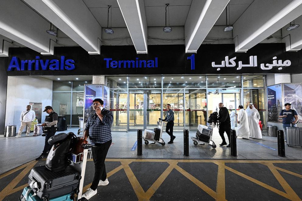 PHOTO: Passengers arrive at Kuwait International Airport in Kuwait City on June 1, 2026.