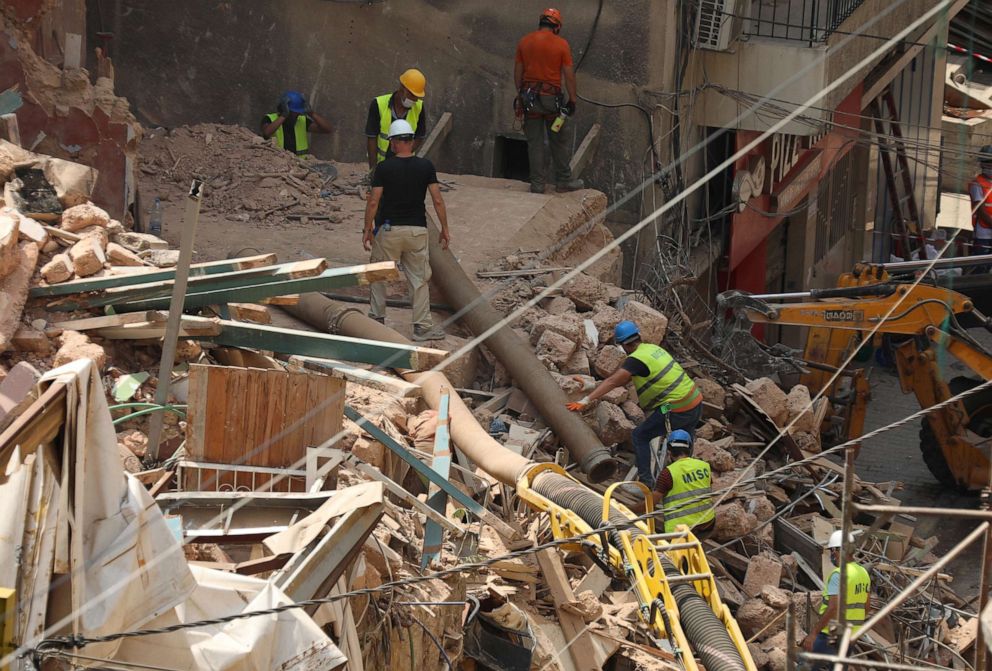 PHOTO: Volunteers and a member of the Chilean rescue team dig through the rubble of buildings which collapsed due to the explosion at the port area, after signs of life were detected, in Gemmayze, Beirut, Lebanon September 5, 2020.