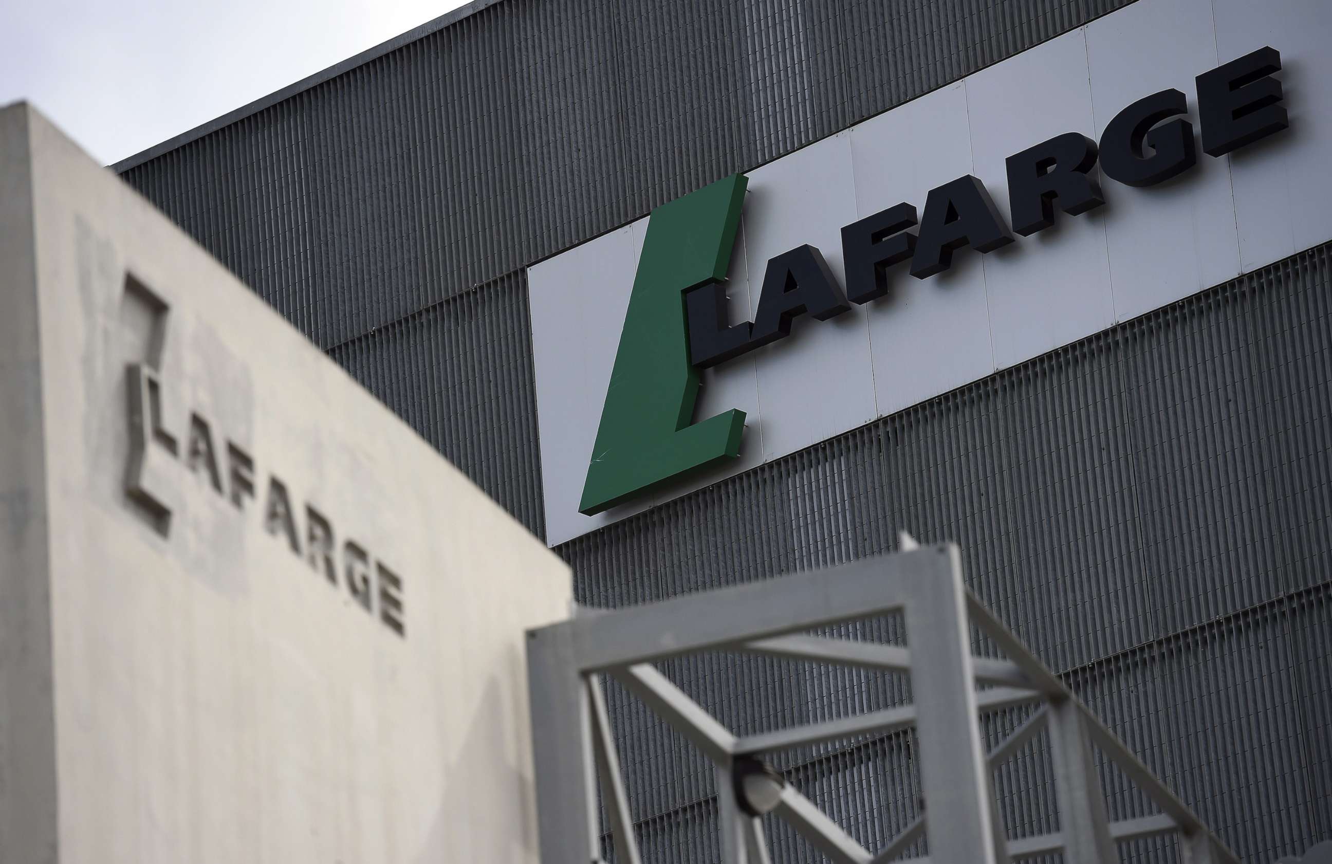 PHOTO: The logo on a plant of French cement company Lafarge on April 7, 2014 in Paris. 