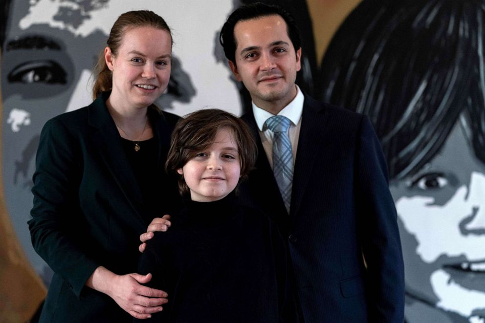 PHOTO: Belgian student Laurent Simons, 9, poses with his parents Lydia and Alexander Simons during a photo session at his home, Nov. 21, 2019.