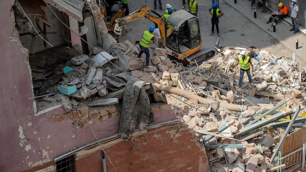 PHOTO: Rescuers search at the site of a collapsed building after getting signals there may be a survivor under the rubble, in Beirut, Lebanon, Saturday, Sept. 5, 2020. 