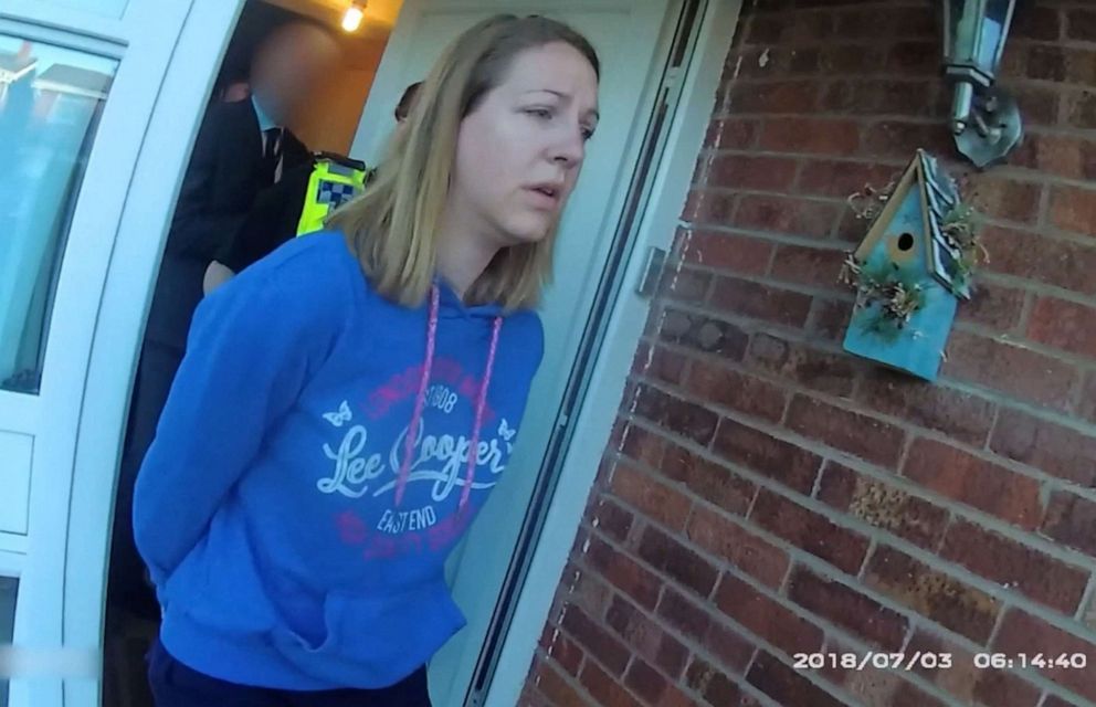PHOTO: A handout image taken from police bodycam footage released by Cheshire Constabulary police force in Manchester on August 17, 2023, shows the nurse Lucy Letby being arrested at home in Chester on July 3, 2018.