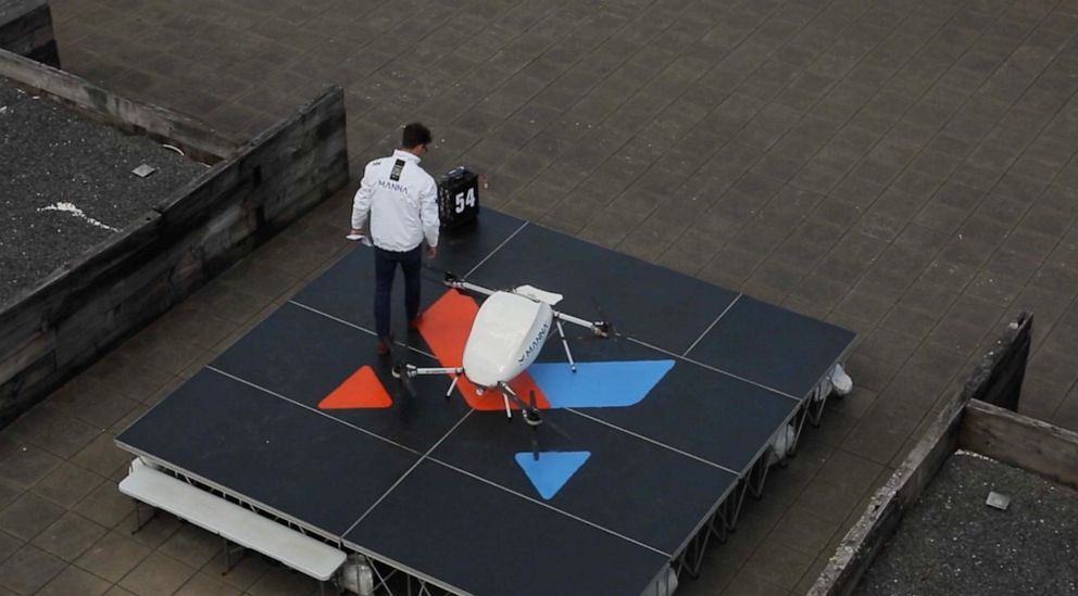 PHOTO: A Manna technician inspects and loads a delivery drone on a launchpad in Oranmore.