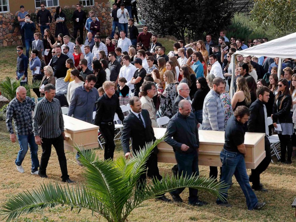 PHOTO: Men carry the caskets of Dawna Ray Langford, 43, and her sons Trevor, 11, and Rogan, 2, who were killed by drug cartel gunmen, during their funeral at the cemetery in La Mora, Sonora state, Mexico, Nov. 7, 2019.
