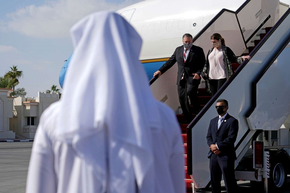 PHOTO: Secretary of State Mike Pompeo and his wife Susan step off a plane at Old Doha International Airport in Doha, Qatar, November 21, 2020. Patrick 