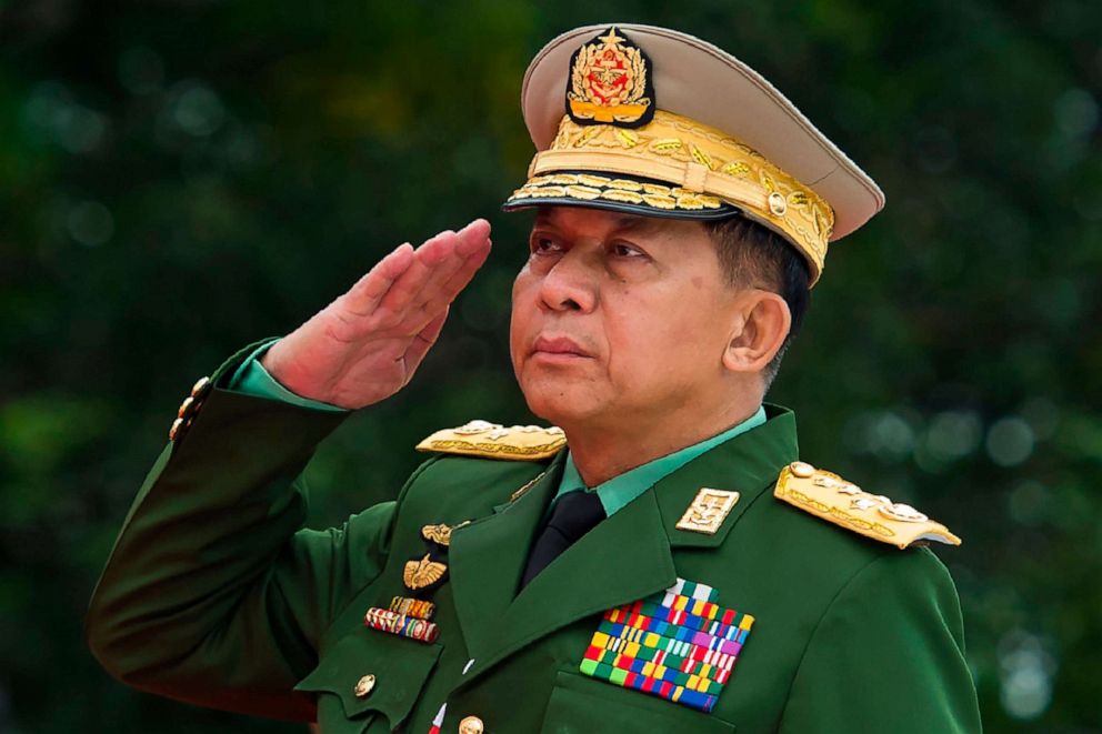 PHOTO: (FILES) In this file photo taken on July 19, 2018, Myanmar's Chief Senior General Min Aung Hlaing, commander-in-chief of the Myanmar armed forces, salutes to pay his respects to Myanmar independence hero General Aung San. 