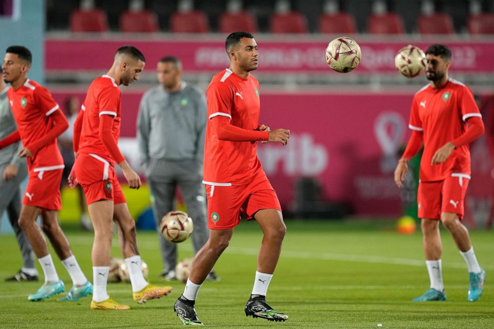 PHOTO: Morocco's Walid Cheddira, center, and teammates practice during a training session at the Duhail Stadium in Doha, Qatar, Dec. 13, 2022.