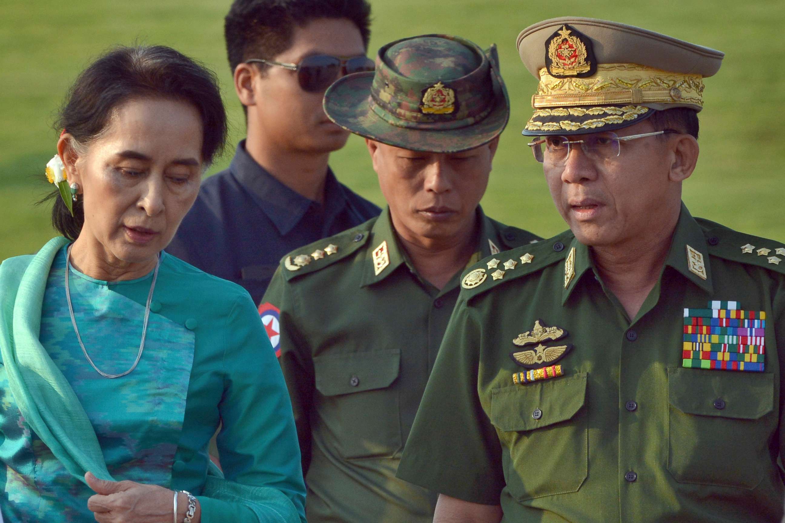 PHOTO: FILE - In this May 6, 2016, file photo, Aung San Suu Kyi, left, Myanmar's foreign minister, walks with senior General Min Aung Hlaing, right, Myanmar military's commander-in-chief, in Naypyitaw, Myanmar. 