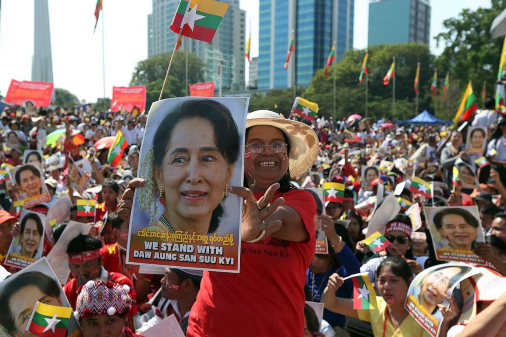 PHOTO: Supporters hold portraits of Myanmar leader Aung San Suu Kyi march on a street in downtown Yangon toward City Hall for a rally Tuesday, Dec. 10, 2019, in Yangon, Myanmar. (AP Photo/Thein Zaw) (AP Photo/Thein Zaw)