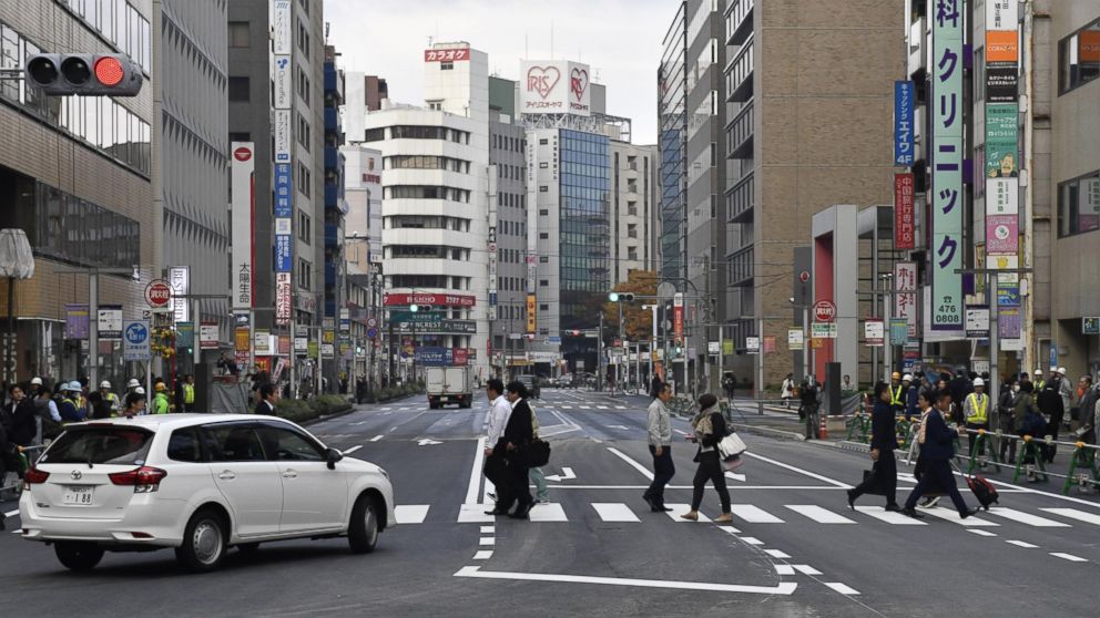 PHOTO: A road in front of JR Hakata station in the southwestern Japan city of Fukuoka reopens on Nov. 15, 2016, after a huge sinkhole there was filled with soil. The sinkhole measured 30-meter-long, 27-meter-wide, 15-meter-deep.