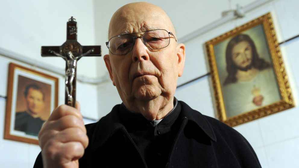 PHOTO: Italian priest exorcist Father Gabriele Amorth poses in his office in Rome, Feb. 16, 2012.