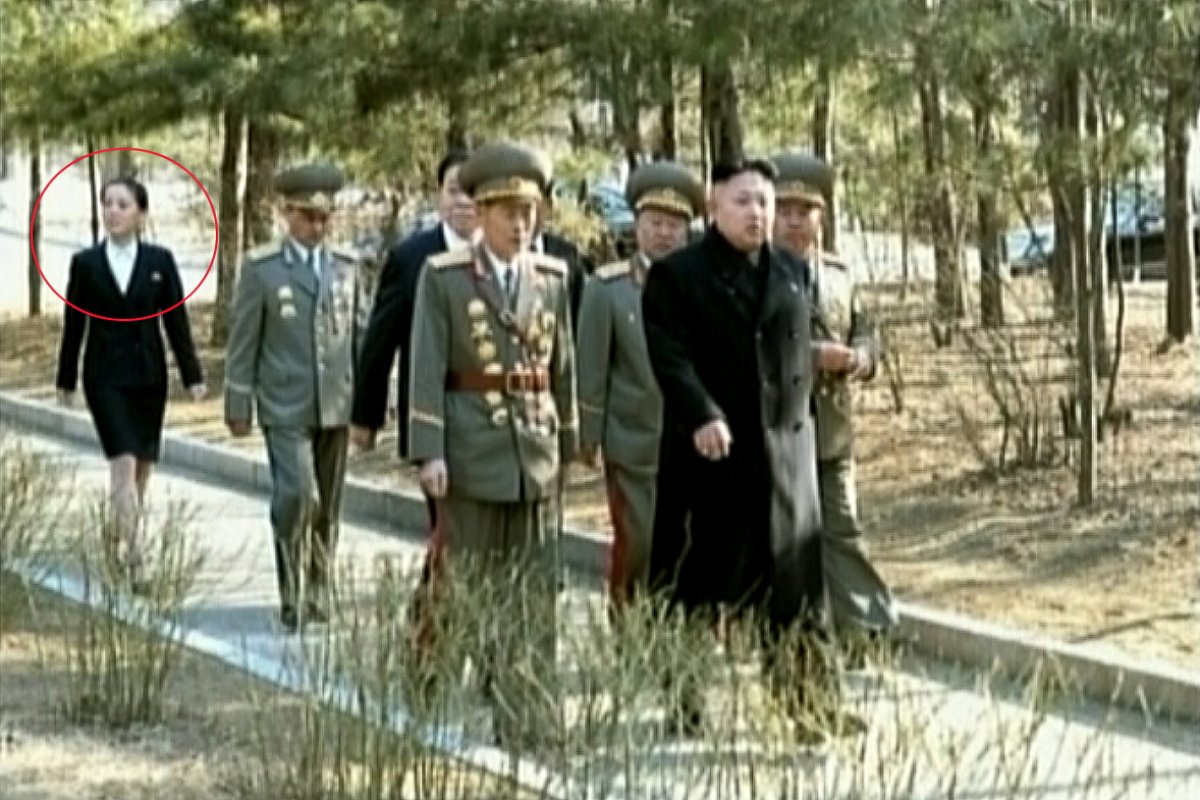 PHOTO: Kim Jong-un with sister Yo-jong Kim Yo-jong (circled) is seen at Kim Il-sung University of Politics in Pyongyang in this March 9, 2014, file photo. 