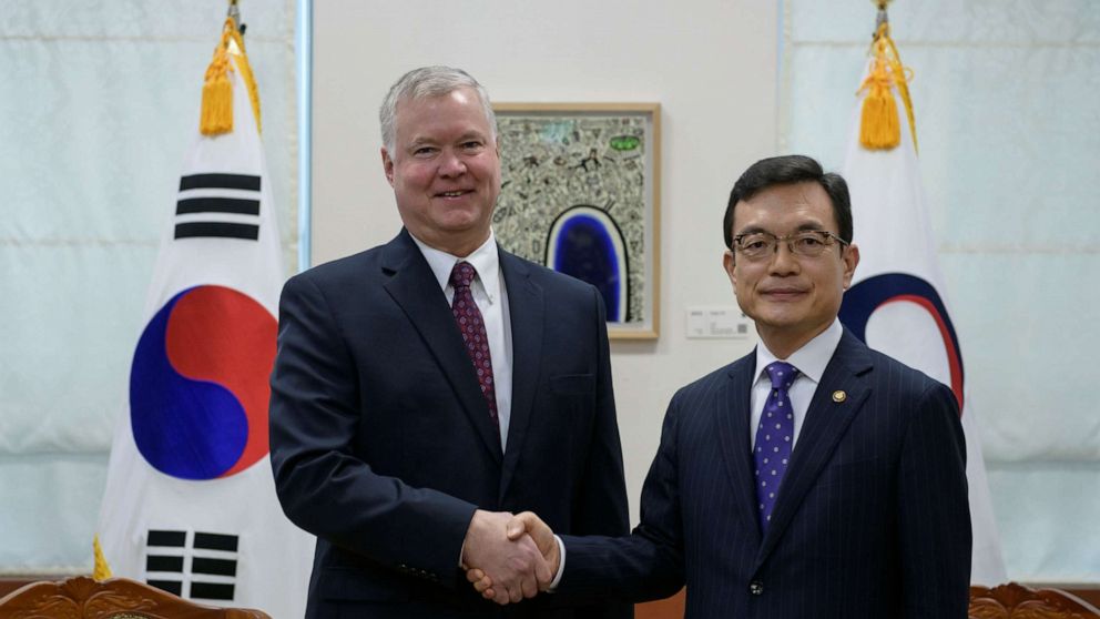 PHOTO: US special representative for North Korea Stephen Biegun (L) shakes hands with with South Korea's vice foreign minister Cho Sei-young (R) at the foreign ministry in Seoul, South Korea December 16, 2019.  Ed Jones/Pool via REUTERS
