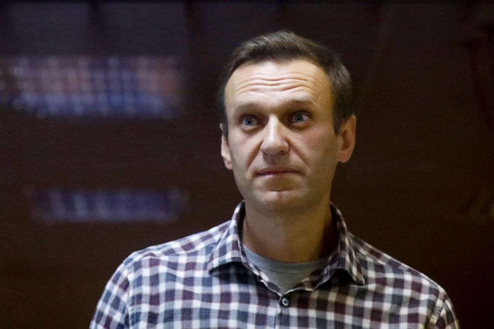 PHOTO: Russian opposition leader Alexei Navalny stands in a cage in the Babuskinsky District Court in Moscow, Feb. 20, 2021. 