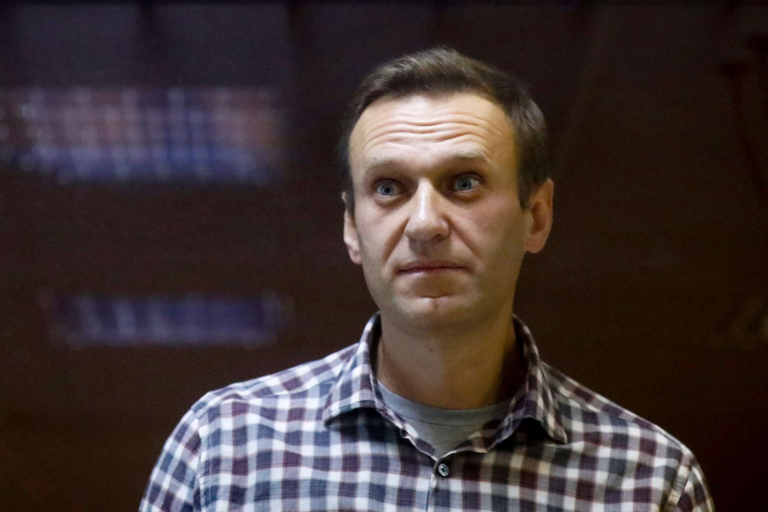 PHOTO:Russian opposition leader Alexei Navalny stands in a cage in the Babuskinsky District Court in Moscow, Feb. 20, 2021. 